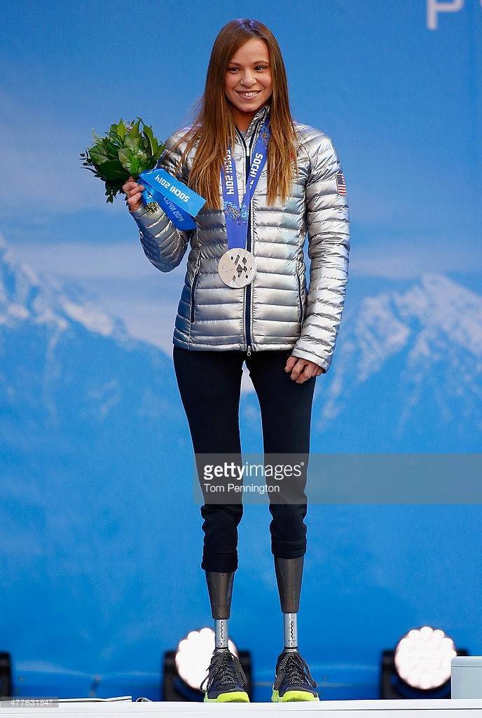 A photo of Oksana on the medal platform with her silver medal for the Nordic Biathalon in the 2014 Paralympic Winter Games.