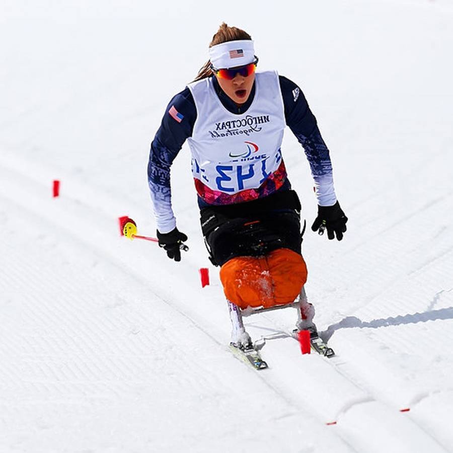 A close up photo of Oksana competing in Nordic Skiing at the 2014 Paralympic Winter Games.